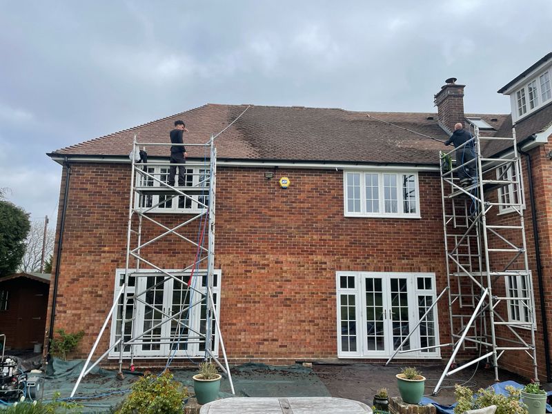 Roof cleaning carried out safely from scaffold towers by The Roof Moss Cleaners in Chinnor